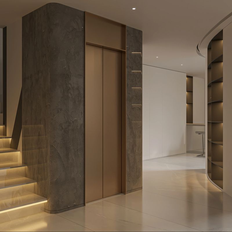 Modern Luxury Interior with Elevator and Illuminated Staircase