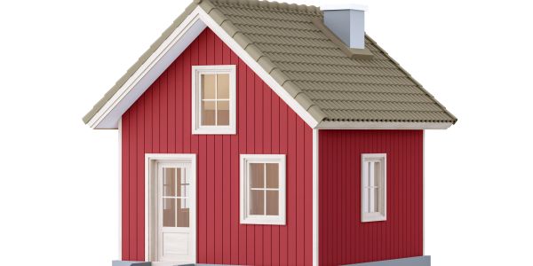 A small red house with white trim and a gray roof.