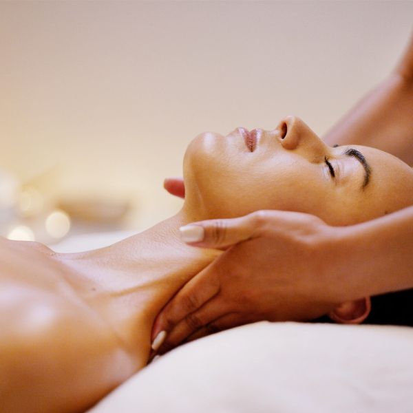 people receiving neck face and head soothing massage treatments and relaxation therapies
