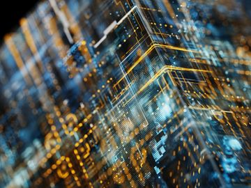 Close-up of video and audio cables connected to a device.