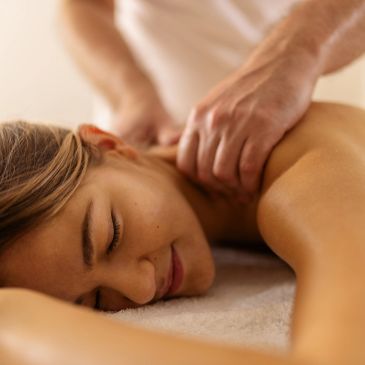 Woman enjoying a massage in our spa.