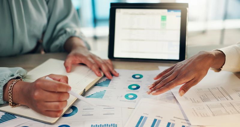 Business people, hands or tablet screen with documents for project management or schedule planning at office. Employees, team or colleagues working with technology, paperwork or agenda for deadline