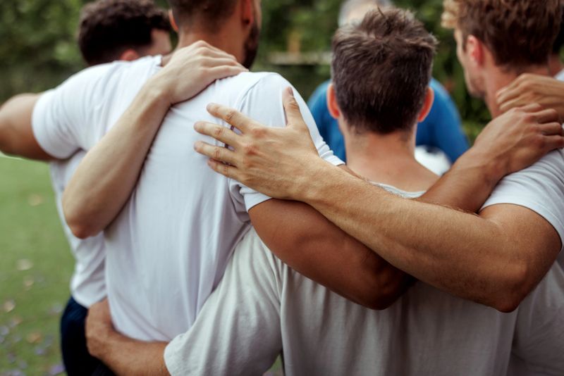 Group of busy happy diverse professional business team people working in office using digital tablet. Multiethnic young startup team working on a project together