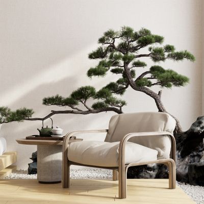Minimalist chair and table with bonsai tree in serene room.