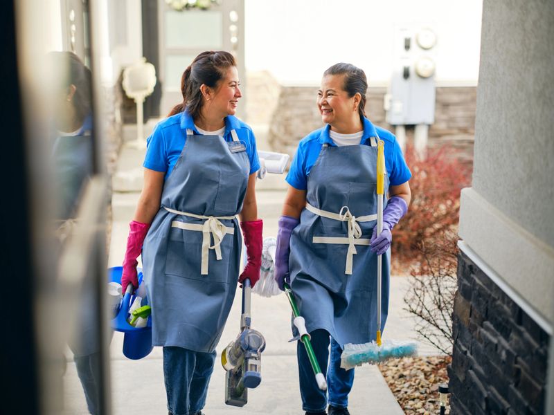 Professional housecleaning service at work in a home.