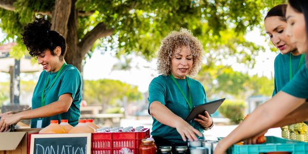 A scenic view of a mountain range under a clear blue sky.