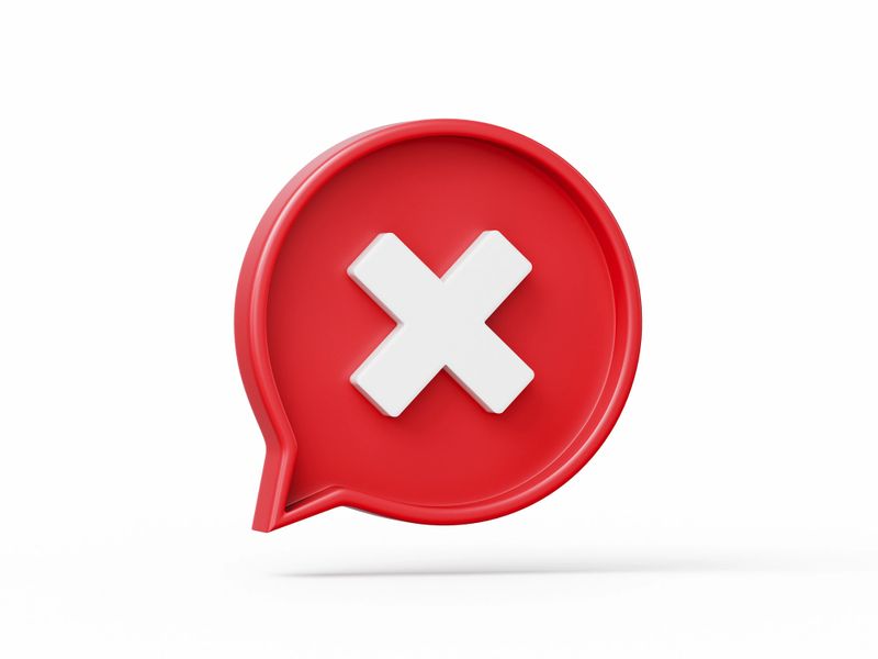 Speech bubble with cross check mark icon isolated on white background