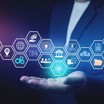 Businessman holding AI and technology icons in holographic hexagons.