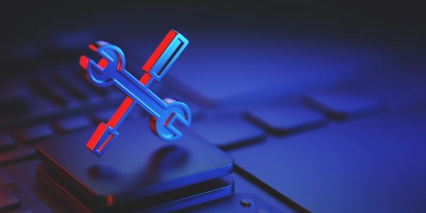 3D wrench and screwdriver icon on a keyboard key.