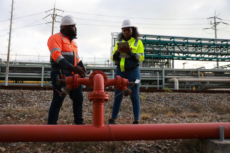 The system safety engineers team  inspecting fire safety equipment Extinguishing Piping System  at a chemical factory