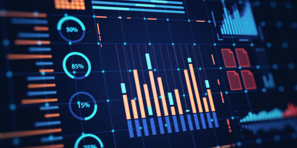 Digital dashboard displaying data charts and percentages.