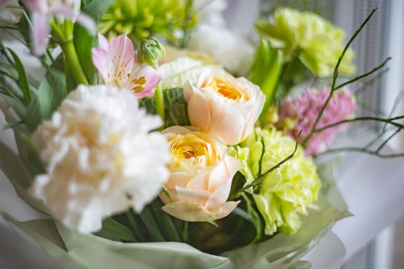 A beautiful bouquet of delicate pastel flowers, perfect for celebrating any occasion with grace and style