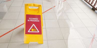 Cleaning in progress sign in office space