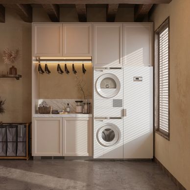 Elegant high end custom laundry room cabinets and shelves.