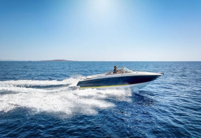 Speedboat cruising on a sunny day.