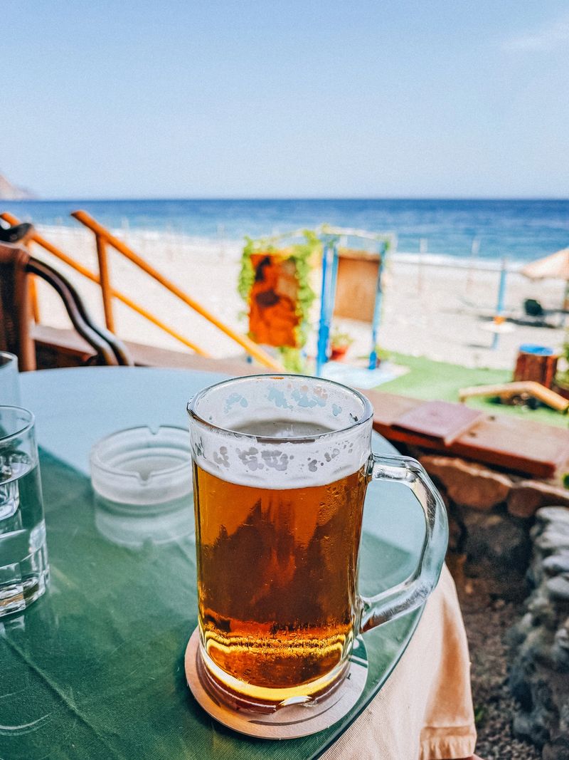 Beer at Sougia beach located on the southwest coast of the Greek island Crete.