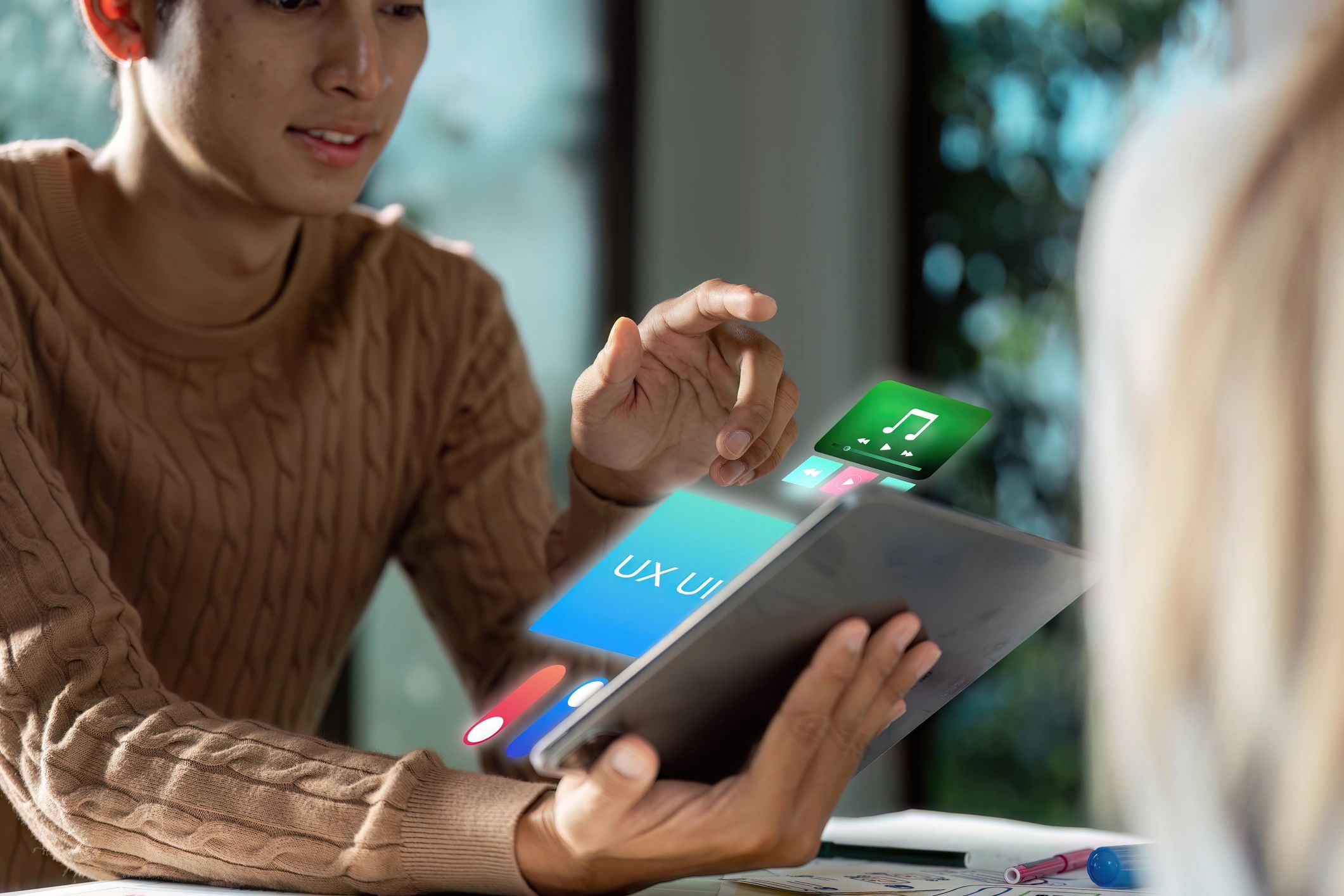 Business person holding a laptop