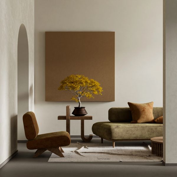 Minimalist living room with earthy tones and modern furniture.