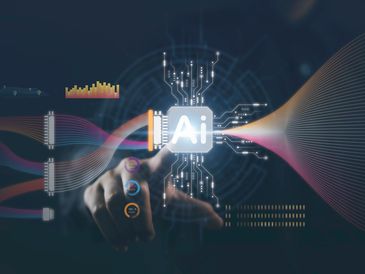 Hand interacting with AI chip and data streams.
