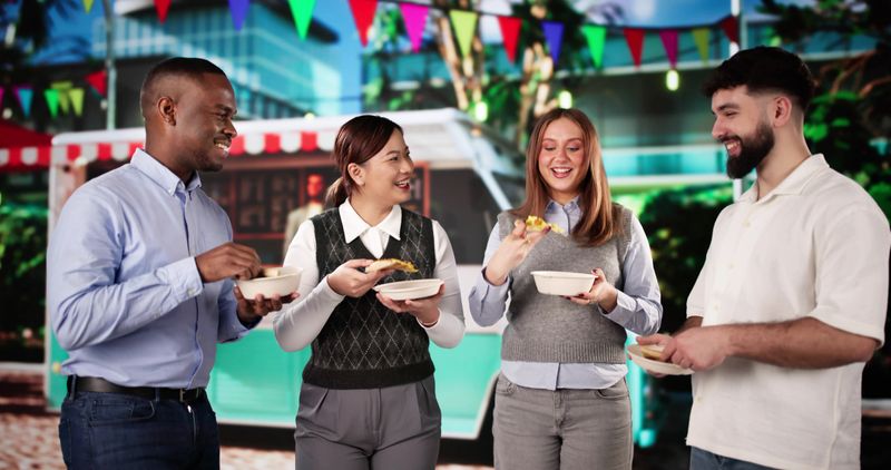 Group Of Friends Having Fun Eating Street Food Meal