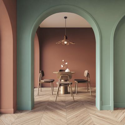 Minimalist dining room with pastel arches and wooden floor.