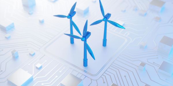 Blue wind turbines on a circuit board symbolizing renewable energy and technology.