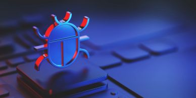 Red and blue bug on keyboard key representing a computer virus.