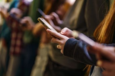 People using smartphones.