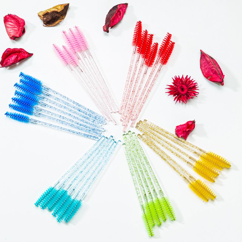 Flatlay of Variety of Working Colorful Brows Makeup Brushes for Cosmetology Beautician Ready For Permanent Makeup Procedure In Beauty Salon. Square Image