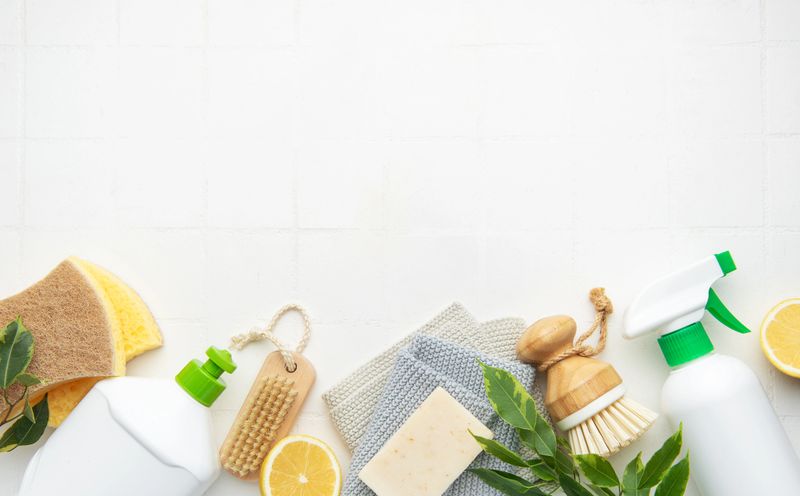 Natural cleaning products and tools promoting a zero waste lifestyle with copy space