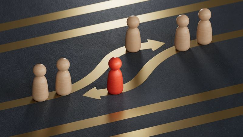 Red and white pawns with golden arrows. Employee swap or turnover concept.Leadership with business success concept.3D rendering on black background.