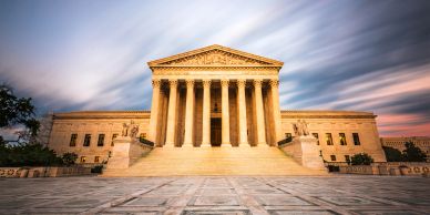 The U.S. Supreme Court building at sunset.