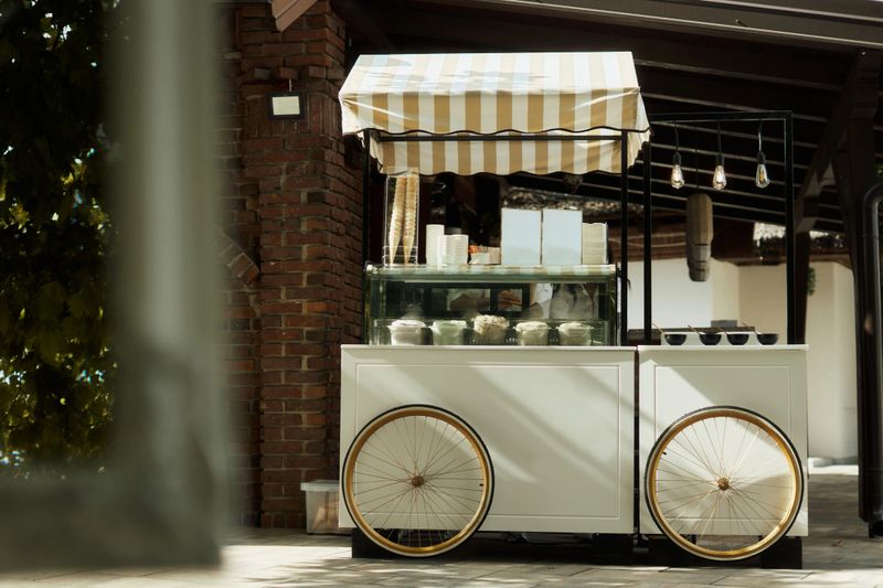 Photo of a trailer for serving ice cream on a celebration day, wedding, birthday.