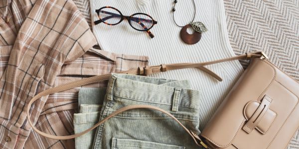 Flat lay of casual clothing and accessories.