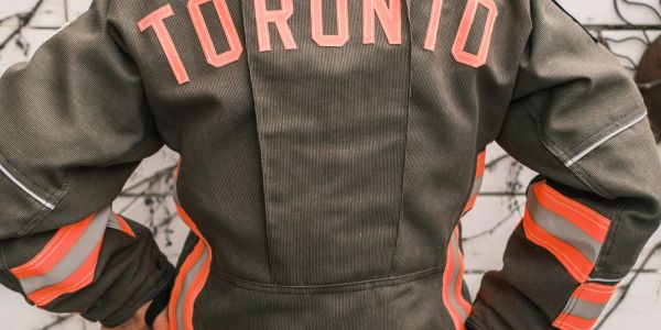 Close-up of a jacket with "TORONTO" text on the back.