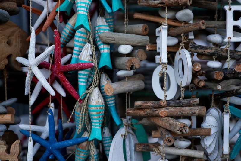Colorful nautical decorations with driftwood and starfish display.