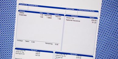 A detailed payslip showing salary, expenses, and tax deductions.