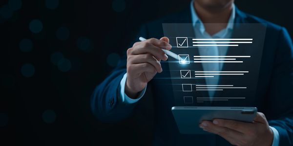 Cybersecurity expert performing penetration testing assessment using digital checklist