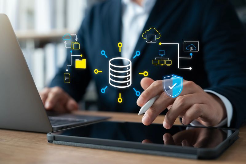 Businessman use intelligent technology cloud computing database system via laptop and tablet, secure online data backup and storage, fast data transfer internet server service the future data network.