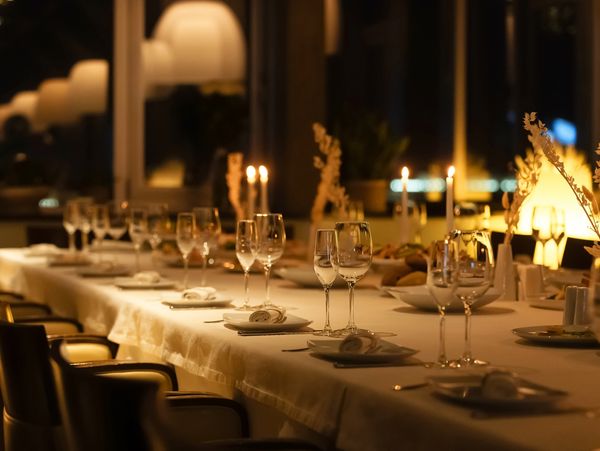 Elegant dining table set for an evening event.