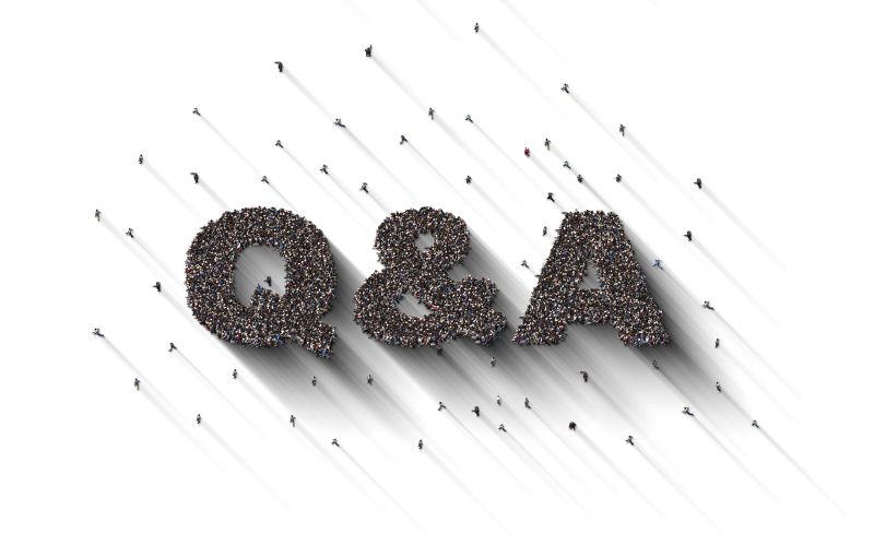 Large Crowd of People Forming Q&A Text on White Background
