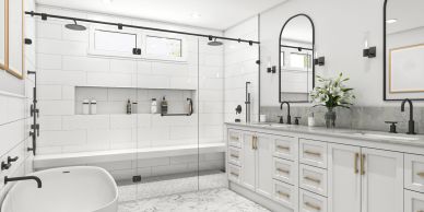 Elegant white bathroom with glass shower and marble flooring.
