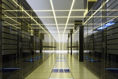 Secure data center with server racks and lighting.