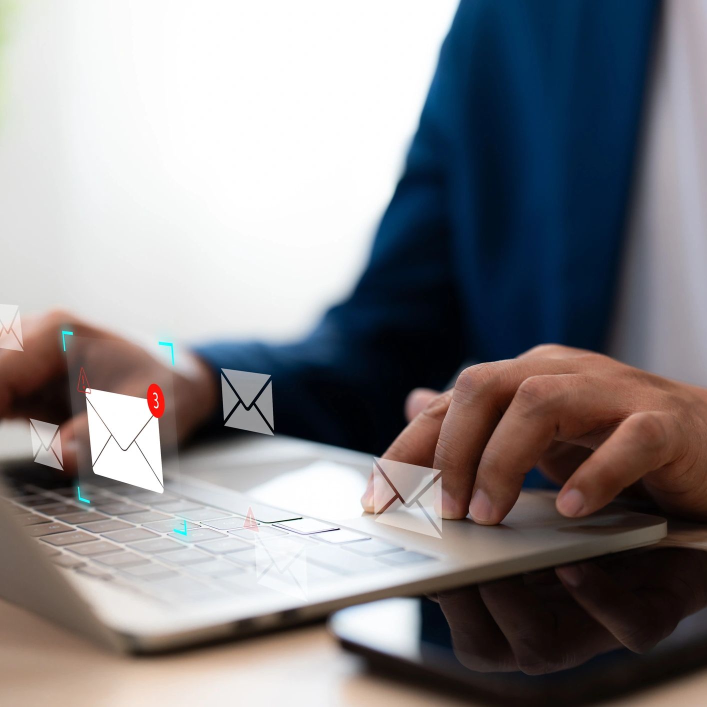 Person checking new email notifications on laptop.