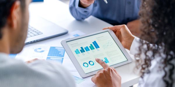 Tucson bookkeeper showing client financial reports