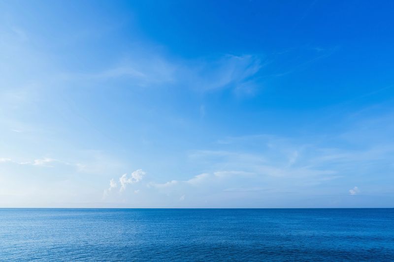 Sky Blue,Cloud Background,Horizon Spring clear sky,white cloudy blue sea ocean in morning,Beautiful nature seascape sunrise in Summer,Panoramic seaside banner white clouds over sea beach before sunset