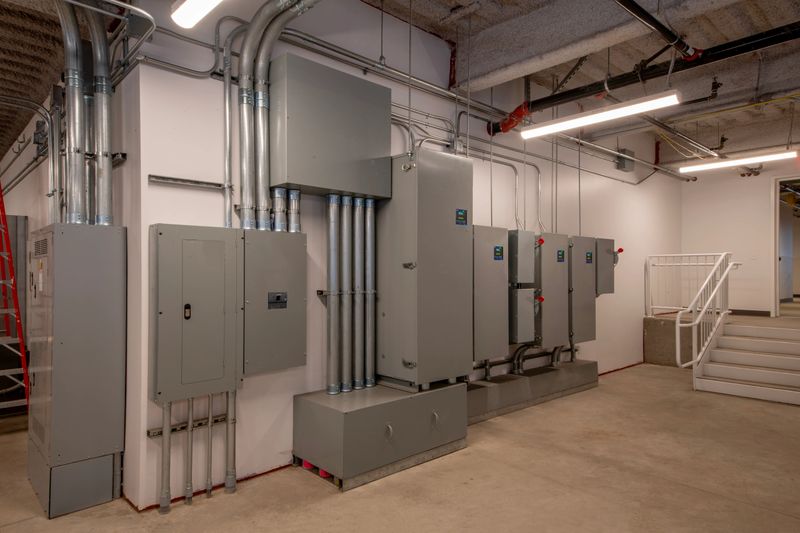Electrical room with breakers and meters.