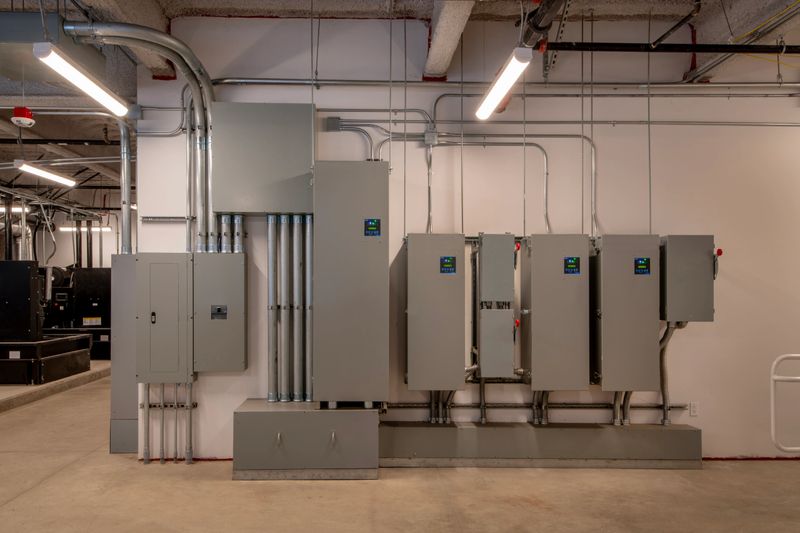 Electrical room with breakers and meters.