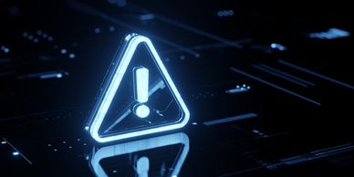 Glowing digital warning symbol on a futuristic dark interface.