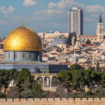 View of Jerusalem's Old City with the iconic Dome of the Rock in the foreground.